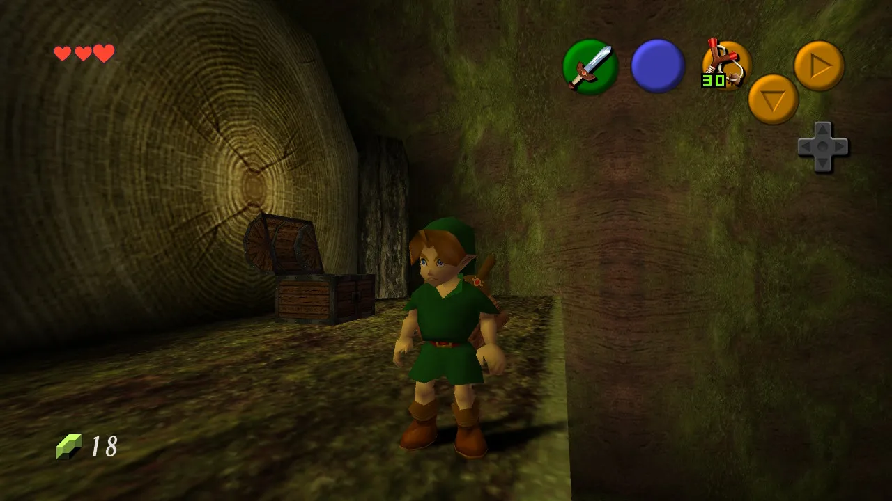 Link inside the Deku Tree, in front of an opened treasure chest. High-definition textures.