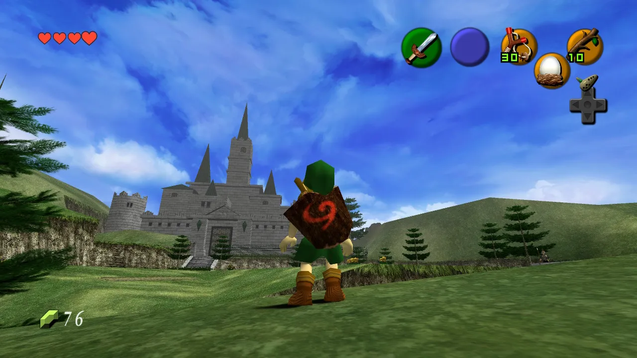 Link from behind, looking at Hyrule Castle on a sunny day with blue sky.